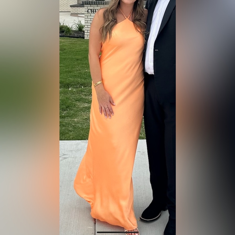 Cantaloupe colored dress. Worn once to wedding. Has been dry cleaned. Like new
